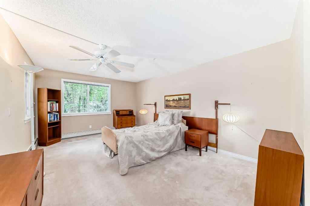 MLS® A2248920 - Unit #213 9449 19 Street SW in Palliser Calgary, Residential