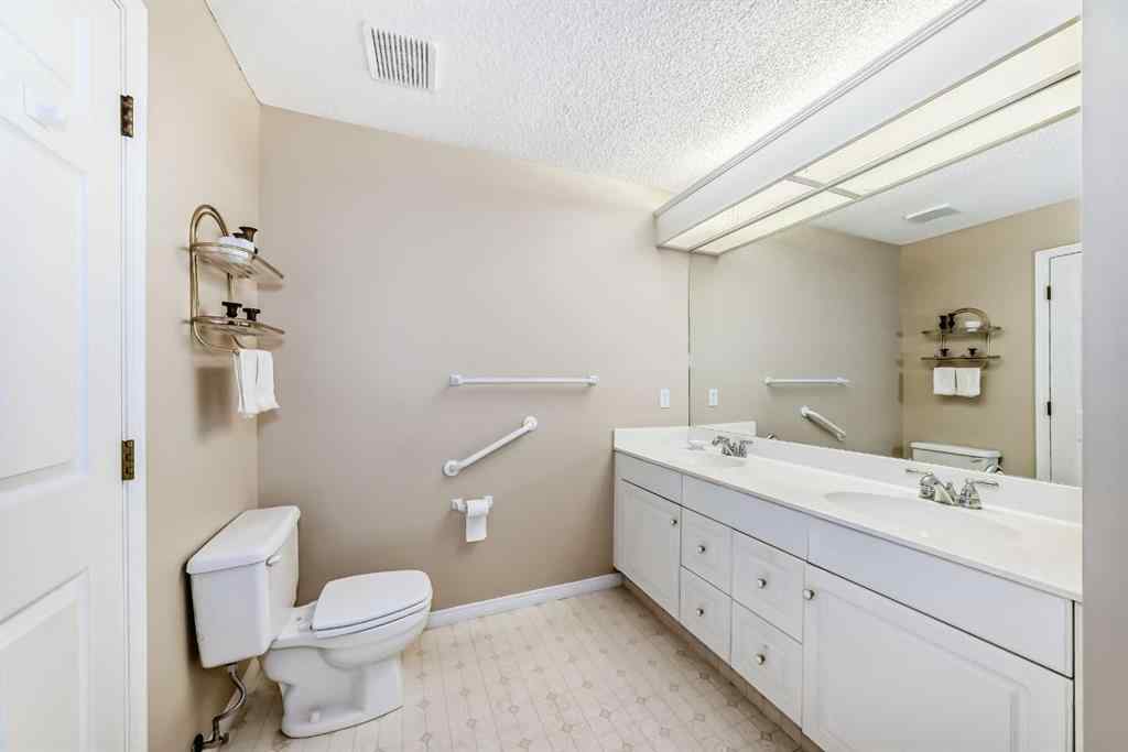 MLS® A2248920 - Unit #213 9449 19 Street SW in Palliser Calgary, Residential