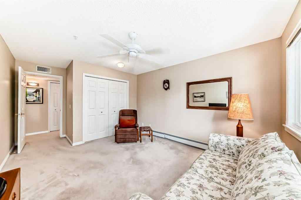 MLS® A2248920 - Unit #213 9449 19 Street SW in Palliser Calgary, Residential