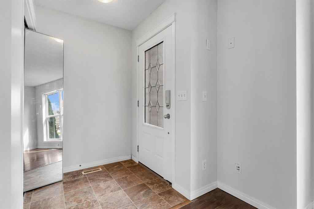 MLS® A2248925 - 60 New Brighton Common SE in New Brighton Calgary, Residential