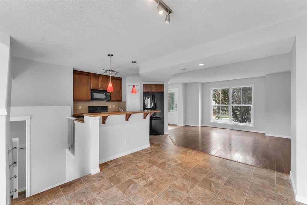 MLS® A2248925 - 60 New Brighton Common SE in New Brighton Calgary, Residential