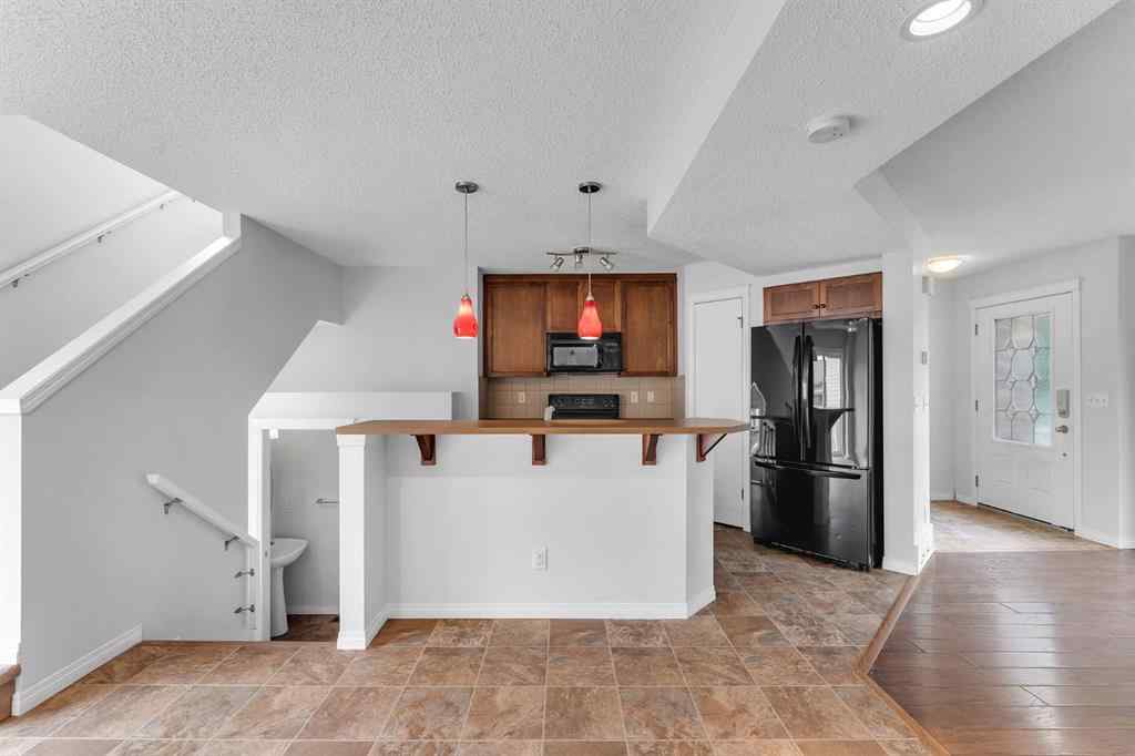 MLS® A2248925 - 60 New Brighton Common SE in New Brighton Calgary, Residential