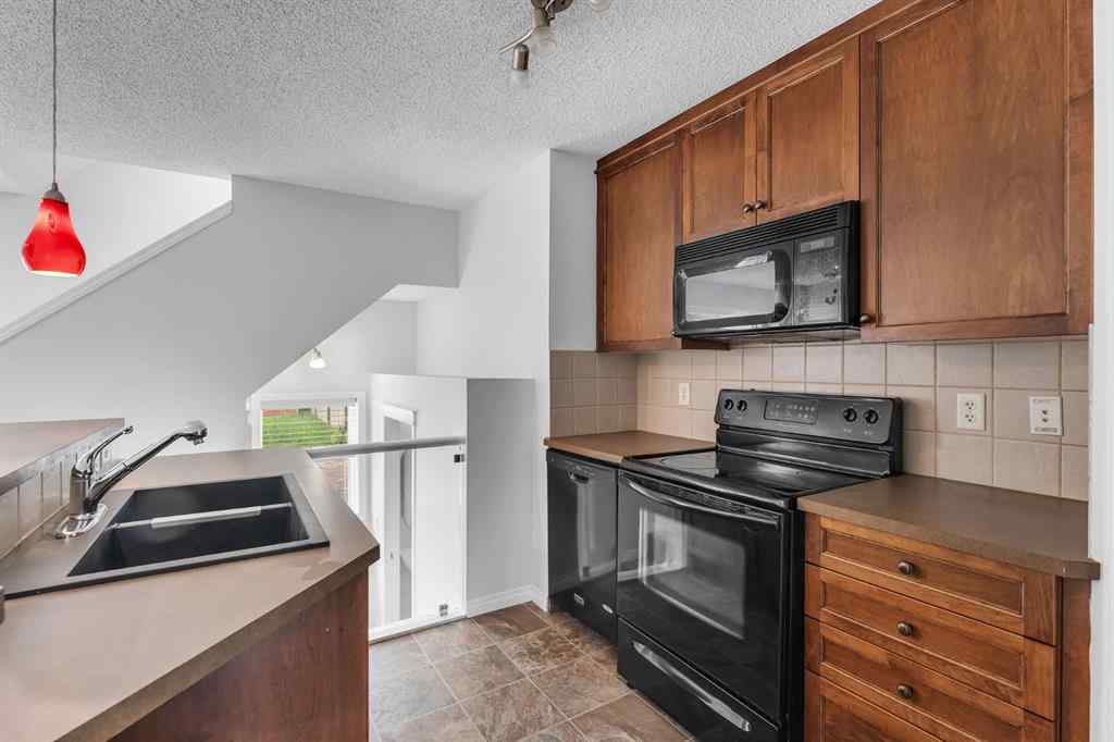 MLS® A2248925 - 60 New Brighton Common SE in New Brighton Calgary, Residential