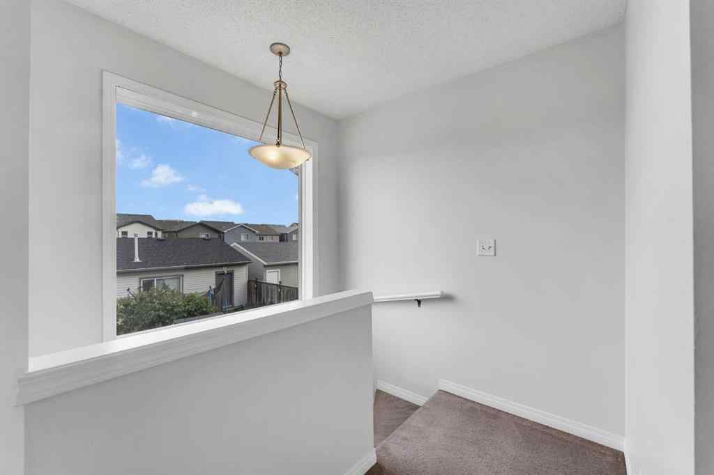 MLS® A2248925 - 60 New Brighton Common SE in New Brighton Calgary, Residential