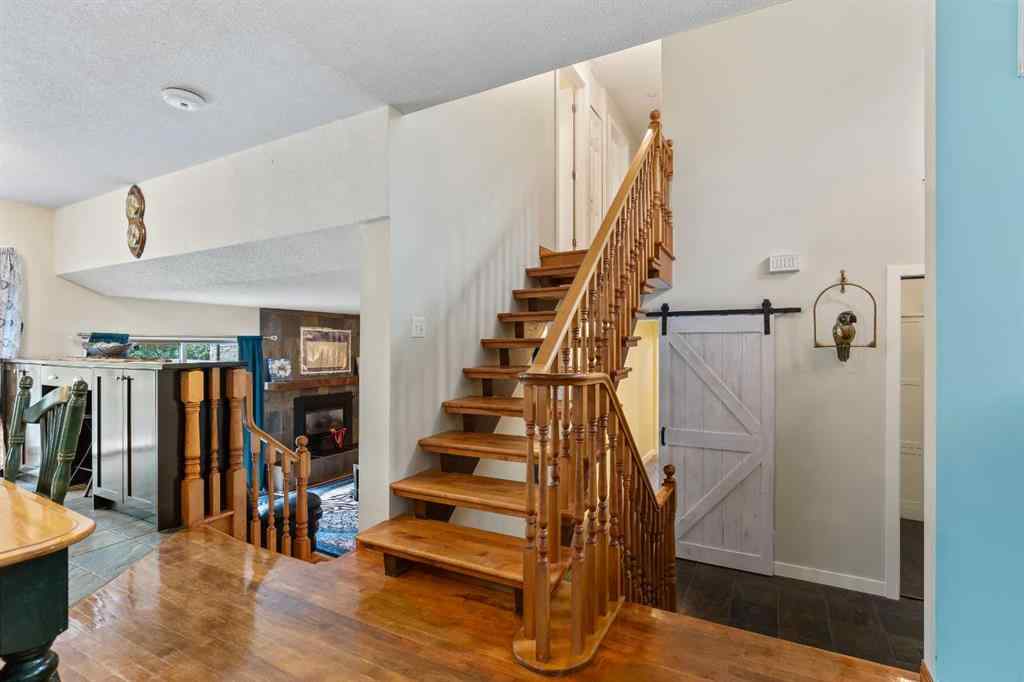 MLS® A2248955 - 51 Redwood meadows Drive  in Redwood Meadows Rural Rocky View County, Residential