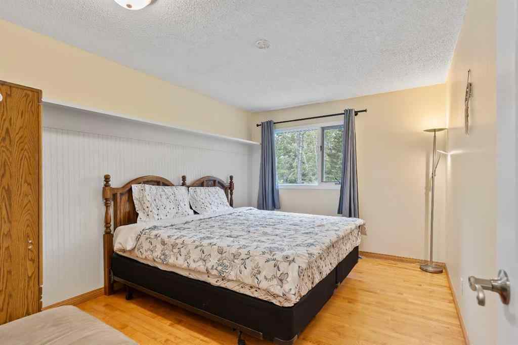 MLS® A2248955 - 51 Redwood meadows Drive  in Redwood Meadows Rural Rocky View County, Residential