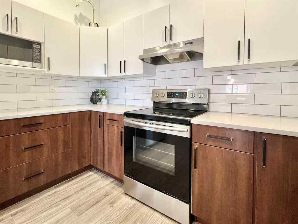 MLS® A2248956 - 11414 106A Avenue  in Westgate Grande Prairie, Residential