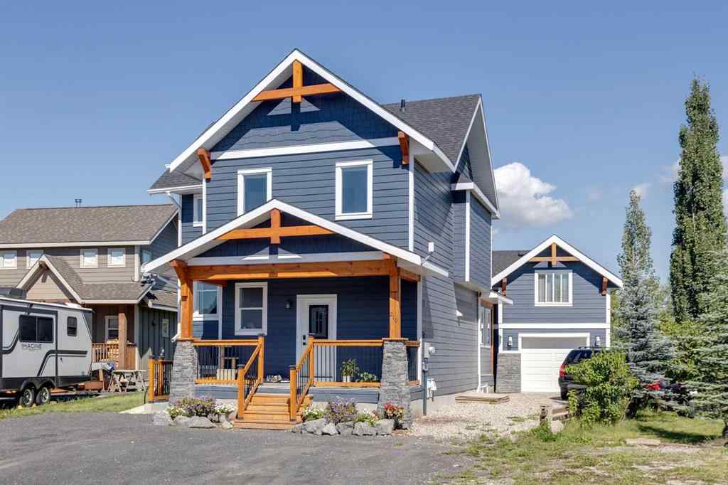 MLS® A2248971 - 216 Cottageclub Crescent  in Cottage Club at Ghost Lake Rural Rocky View County, Residential