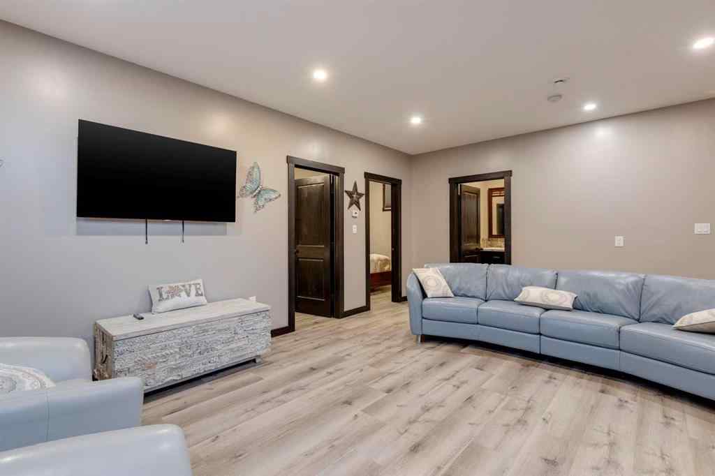 MLS® A2248971 - 216 Cottageclub Crescent  in Cottage Club at Ghost Lake Rural Rocky View County, Residential