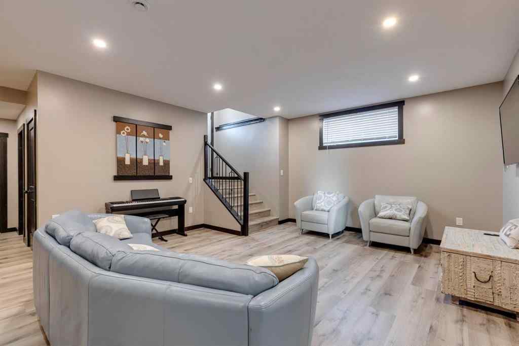 MLS® A2248971 - 216 Cottageclub Crescent  in Cottage Club at Ghost Lake Rural Rocky View County, Residential