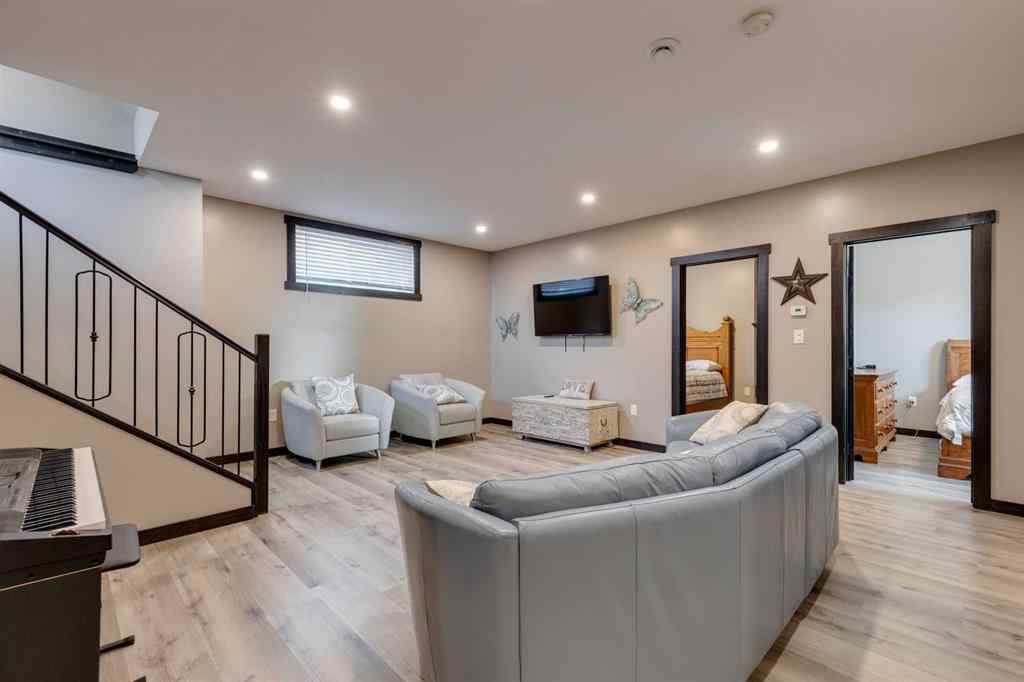 MLS® A2248971 - 216 Cottageclub Crescent  in Cottage Club at Ghost Lake Rural Rocky View County, Residential