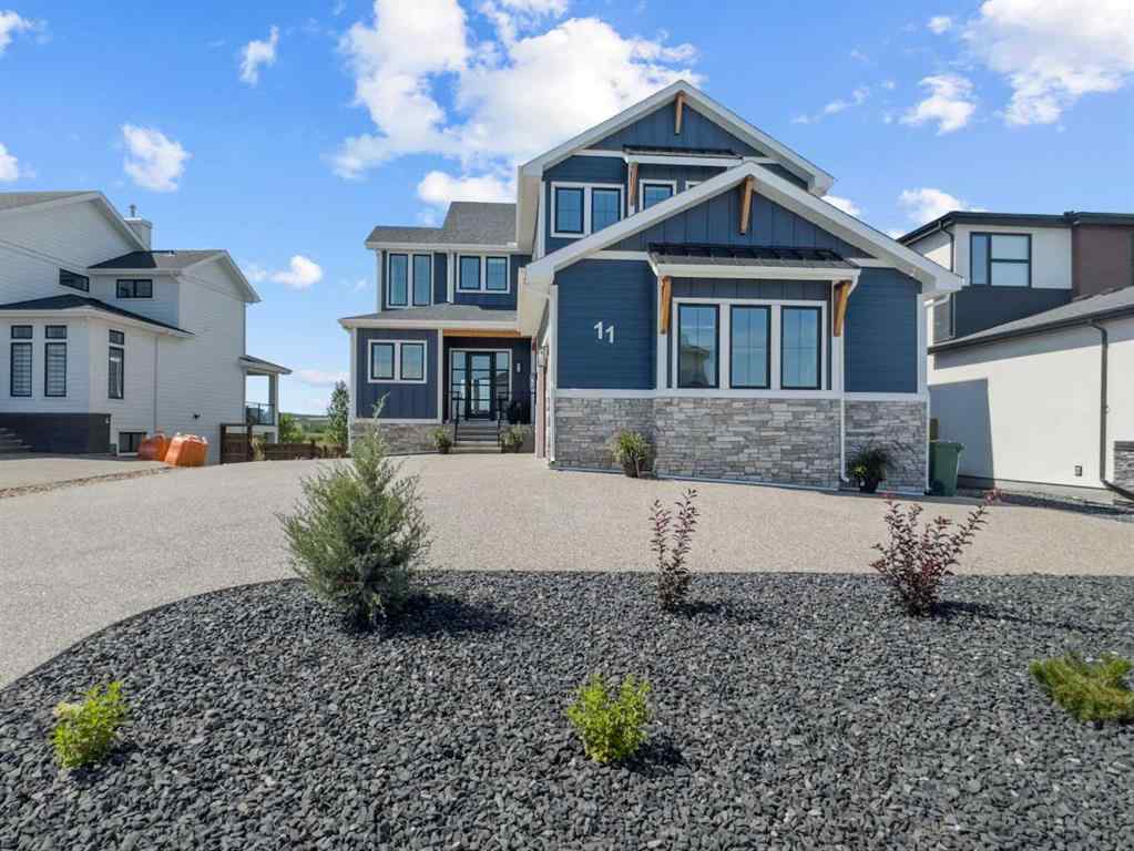 MLS® A2248991 - 11 Chokecherry Ridge  in Harmony Rural Rocky View County, Residential
