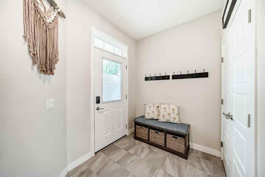 MLS® A2249015 - 106 Kingfisher Crescent SE in Kings Heights Airdrie, Residential