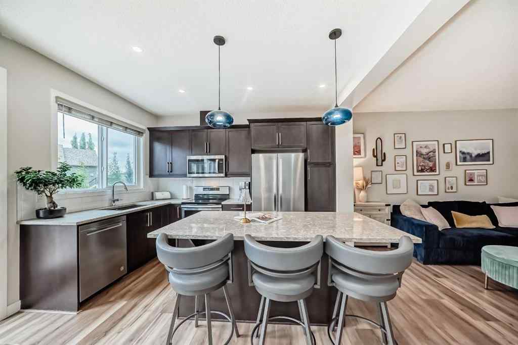 MLS® A2249015 - 106 Kingfisher Crescent SE in Kings Heights Airdrie, Residential