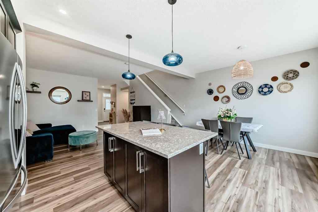 MLS® A2249015 - 106 Kingfisher Crescent SE in Kings Heights Airdrie, Residential
