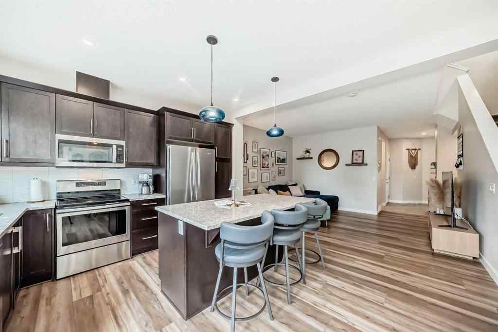 MLS® A2249015 - 106 Kingfisher Crescent SE in Kings Heights Airdrie, Residential