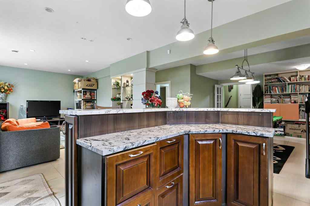 MLS® A2249022 - 22 Wendham Place SW in West Springs Calgary, Residential
