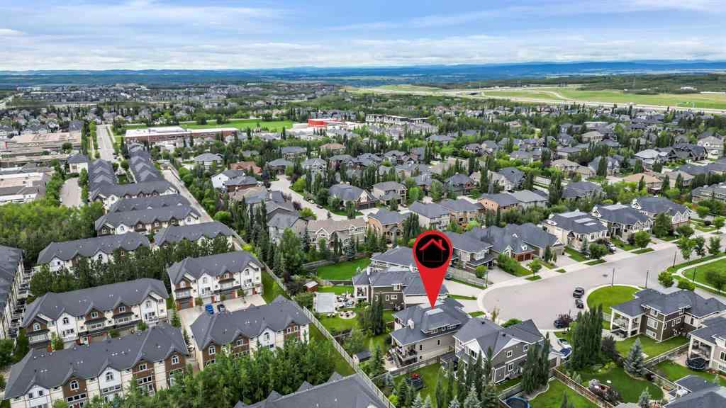 MLS® A2249022 - 22 Wendham Place SW in West Springs Calgary, Residential