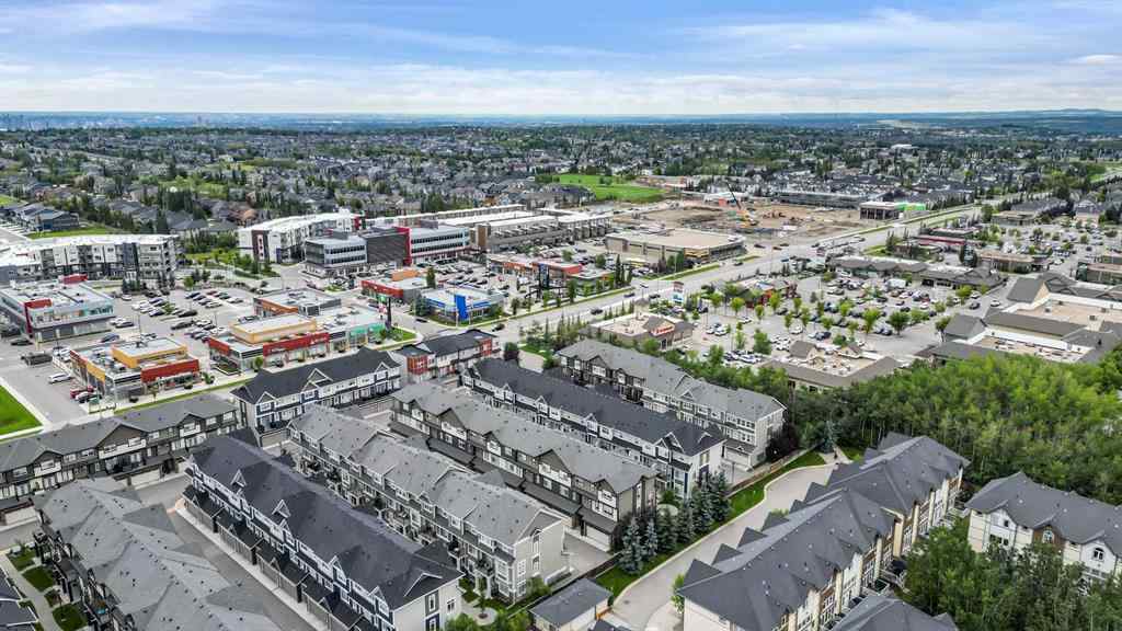 MLS® A2249022 - 22 Wendham Place SW in West Springs Calgary, Residential