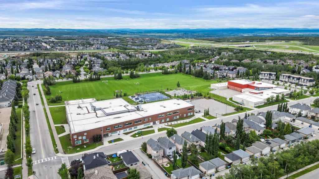 MLS® A2249022 - 22 Wendham Place SW in West Springs Calgary, Residential