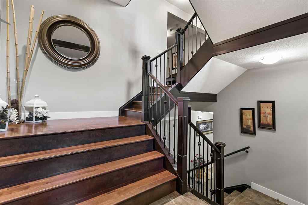 MLS® A2249022 - 22 Wendham Place SW in West Springs Calgary, Residential