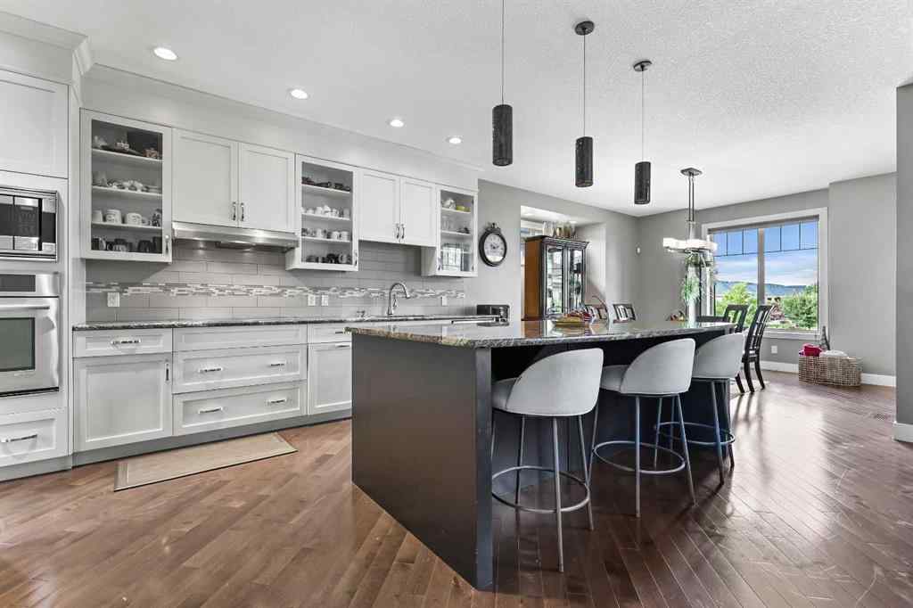 MLS® A2249022 - 22 Wendham Place SW in West Springs Calgary, Residential
