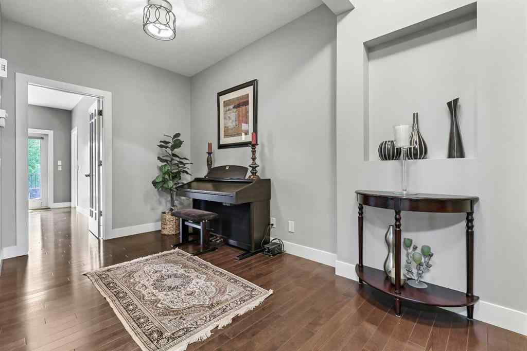 MLS® A2249022 - 22 Wendham Place SW in West Springs Calgary, Residential