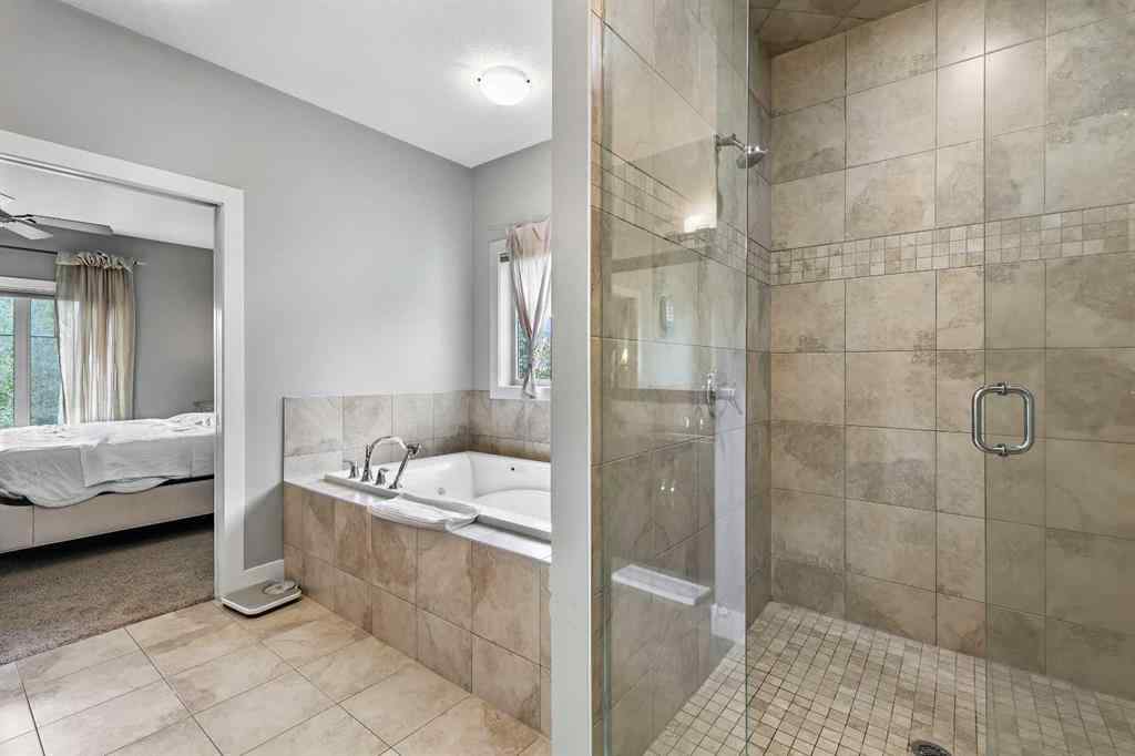 MLS® A2249022 - 22 Wendham Place SW in West Springs Calgary, Residential