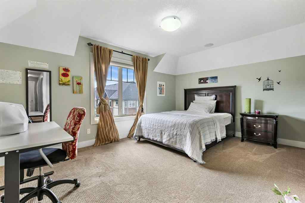 MLS® A2249022 - 22 Wendham Place SW in West Springs Calgary, Residential