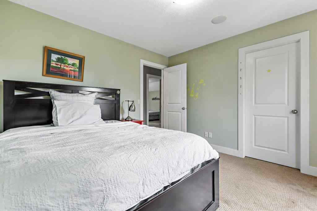 MLS® A2249022 - 22 Wendham Place SW in West Springs Calgary, Residential