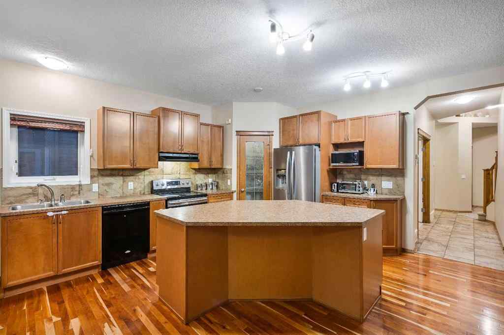 MLS® A2249035 - 213 Hawkmere Close  in Westmere Chestermere, Residential