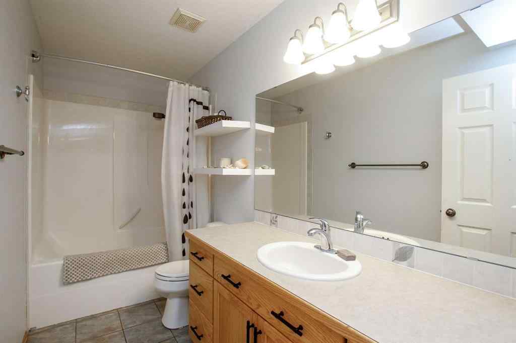 MLS® A2249048 - 107 Ackerman Crescent  in Aspen Ridge Red Deer, Residential