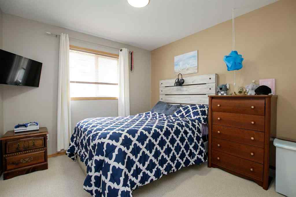 MLS® A2249048 - 107 Ackerman Crescent  in Aspen Ridge Red Deer, Residential