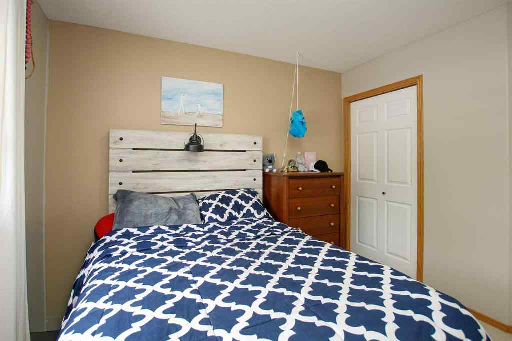 MLS® A2249048 - 107 Ackerman Crescent  in Aspen Ridge Red Deer, Residential