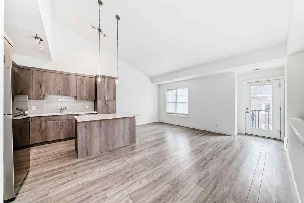 MLS® A2249053 - 645 Cranbrook Walk SE in Cranston Calgary, Residential