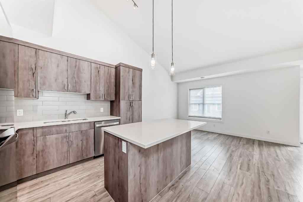 MLS® A2249053 - 645 Cranbrook Walk SE in Cranston Calgary, Residential