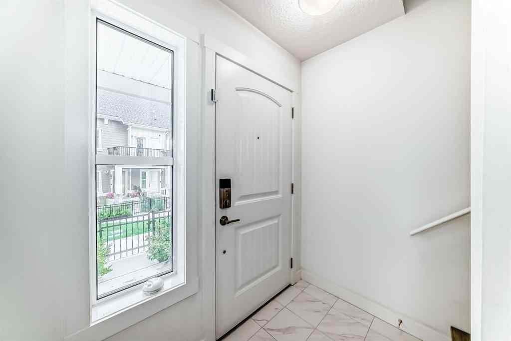 MLS® A2249053 - 645 Cranbrook Walk SE in Cranston Calgary, Residential