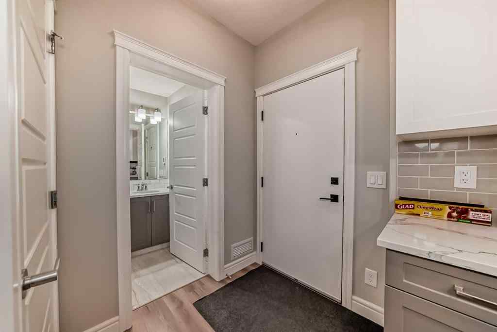 MLS® A2249064 - Unit #102 19661 40 Street SE in Seton Calgary, Residential