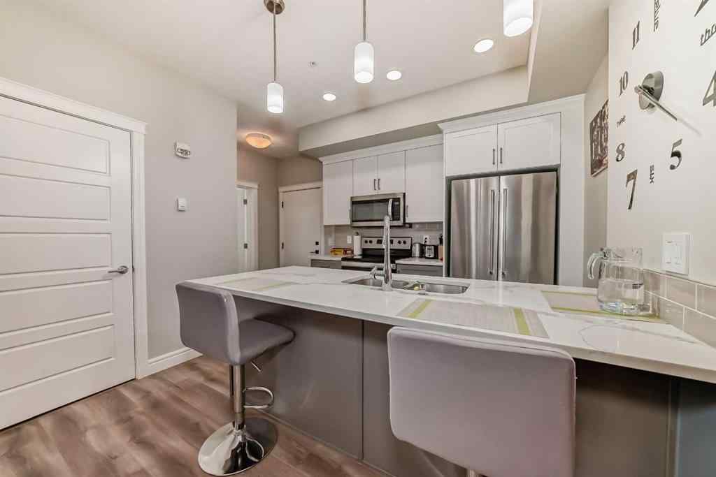 MLS® A2249064 - Unit #102 19661 40 Street SE in Seton Calgary, Residential