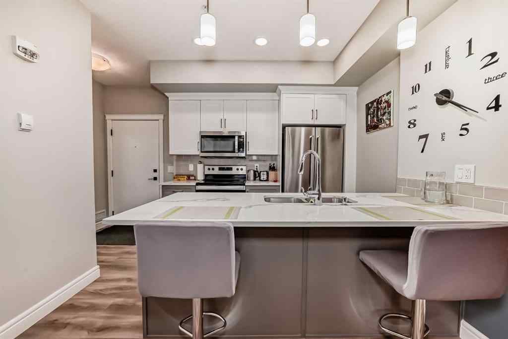 MLS® A2249064 - Unit #102 19661 40 Street SE in Seton Calgary, Residential