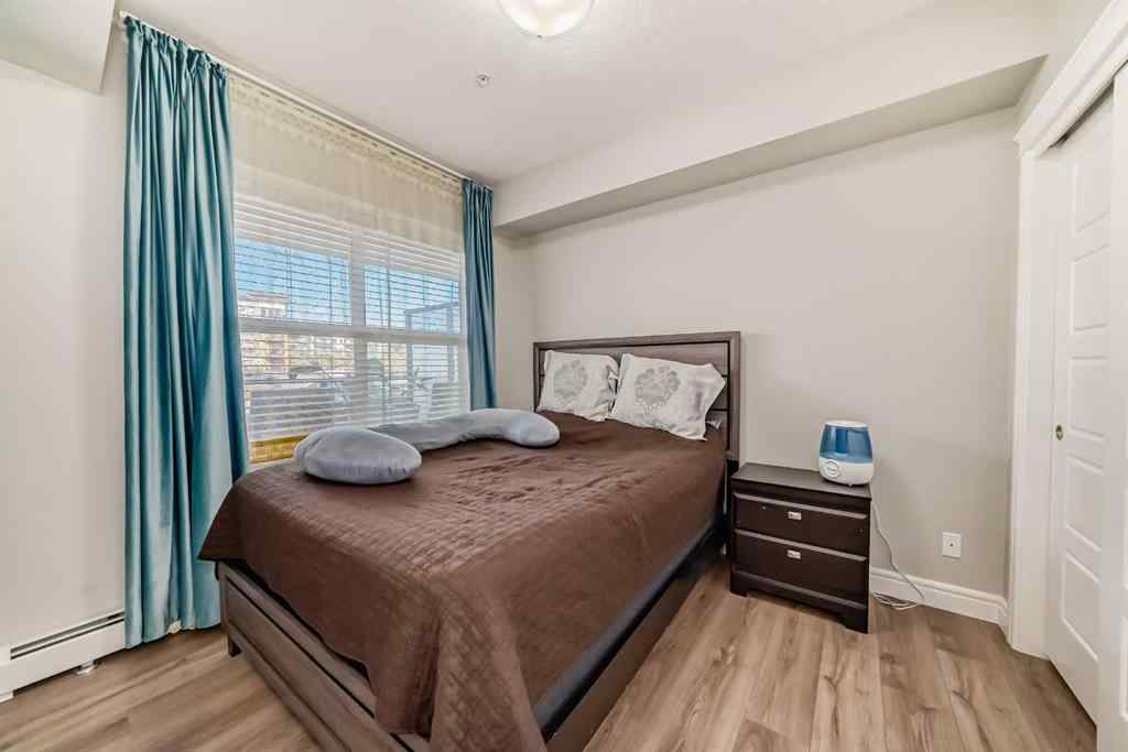 MLS® A2249064 - Unit #102 19661 40 Street SE in Seton Calgary, Residential
