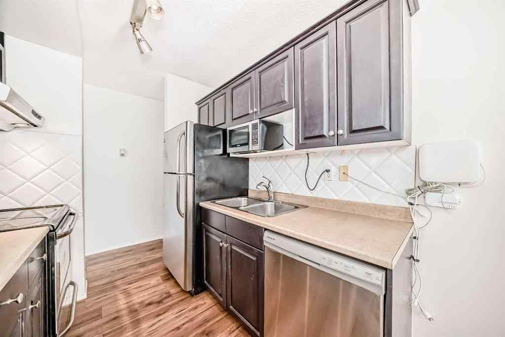 MLS® A2249068 - Unit #408 320 24 Avenue SW in Mission Calgary, Residential