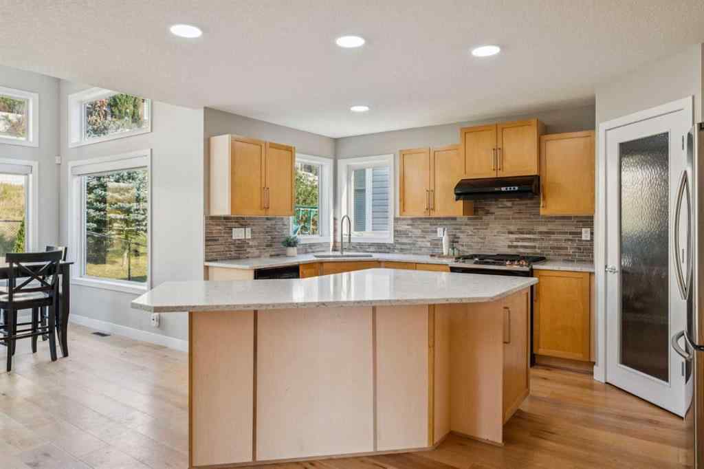 MLS® A2249079 - 7728 Springbank Way SW in Springbank Hill Calgary, Residential