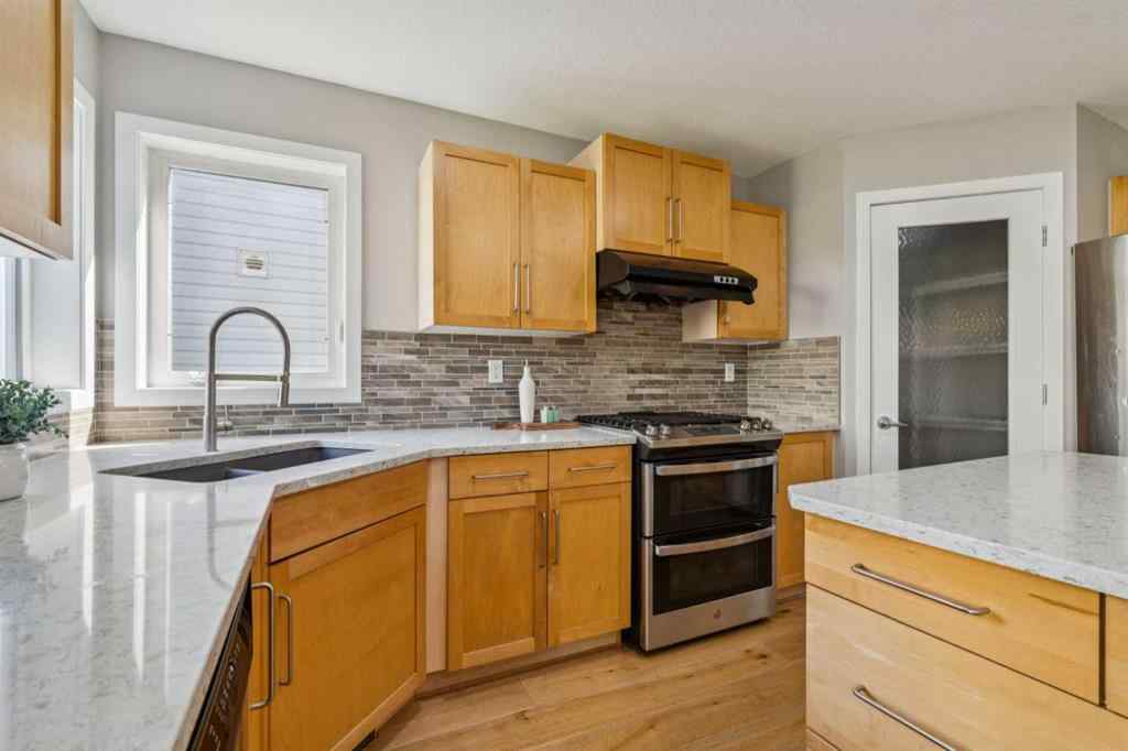 MLS® A2249079 - 7728 Springbank Way SW in Springbank Hill Calgary, Residential