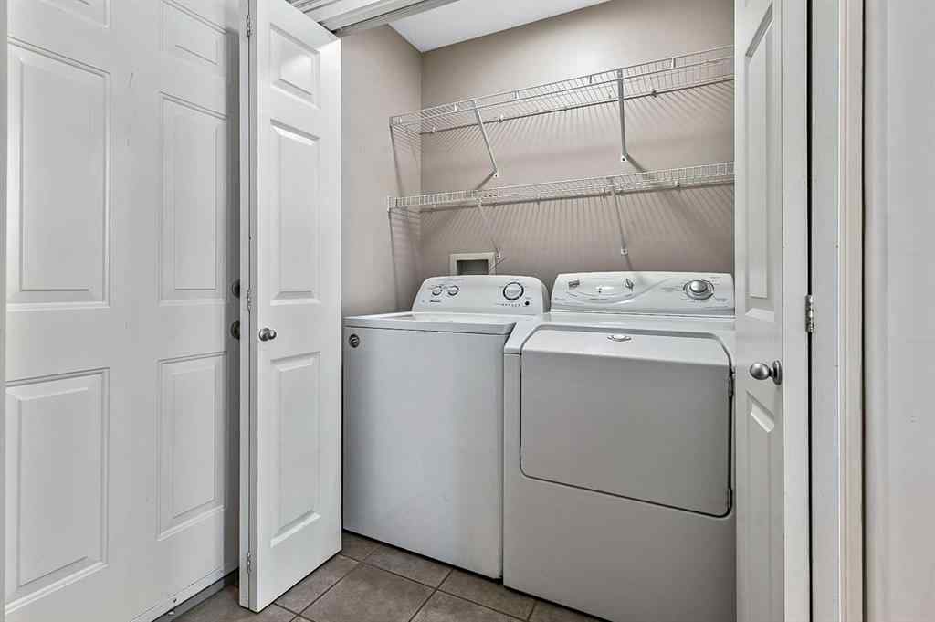 MLS® A2249101 - 287 Crystal Shores Drive  in Crystal Shores Okotoks, Residential