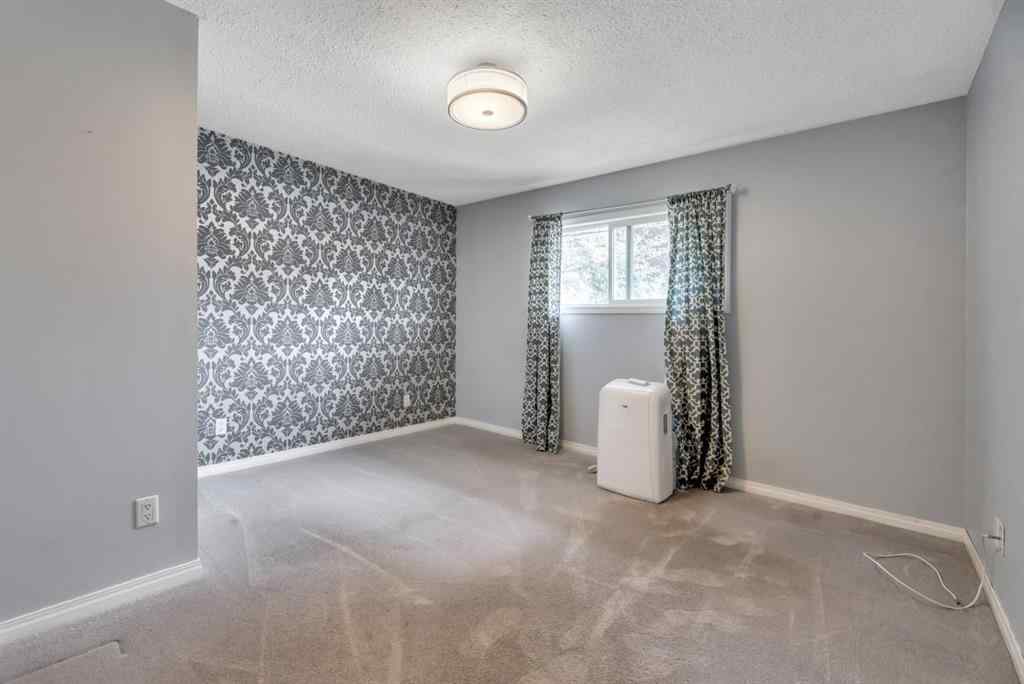 MLS® A2249164 - 8319 Bowness Road  in Bowness Calgary, Residential