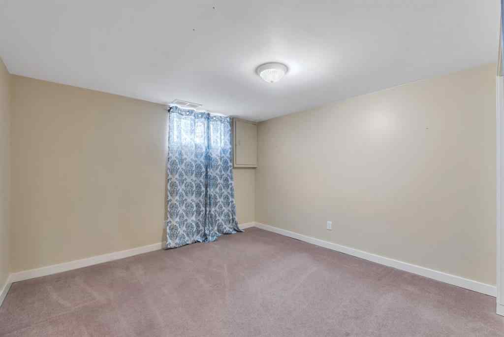 MLS® A2249164 - 8319 Bowness Road  in Bowness Calgary, Residential