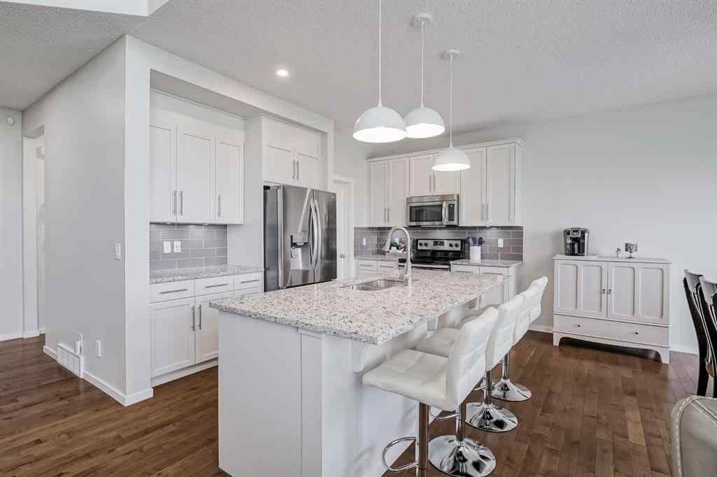 MLS® A2249190 - 225 Kingsmere Cove SE in Kings Heights Airdrie, Residential