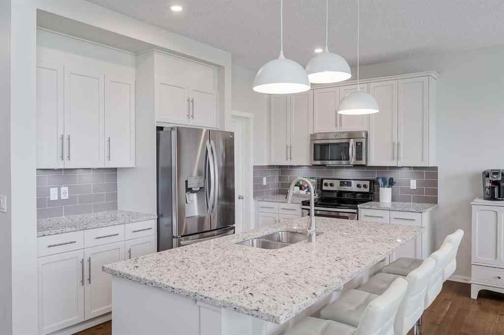 MLS® A2249190 - 225 Kingsmere Cove SE in Kings Heights Airdrie, Residential