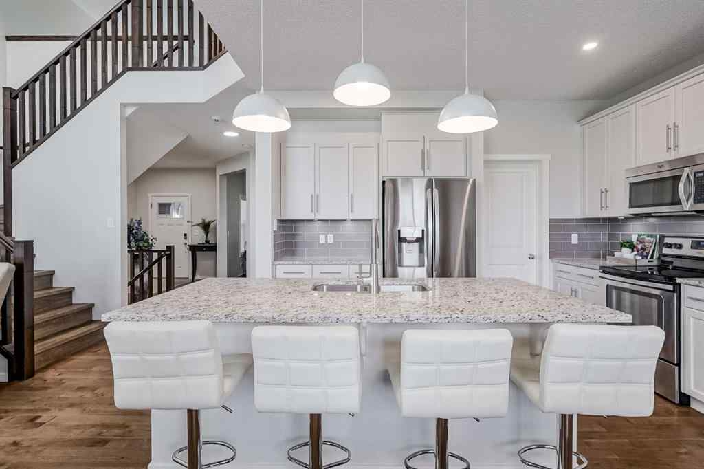 MLS® A2249190 - 225 Kingsmere Cove SE in Kings Heights Airdrie, Residential